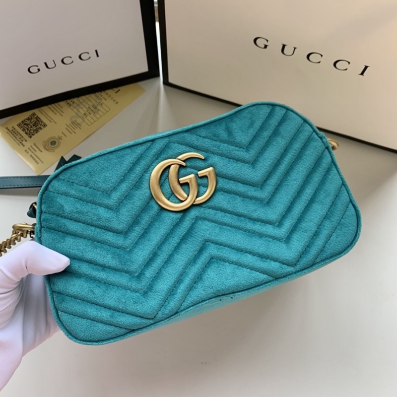 G*u*i clutch bags